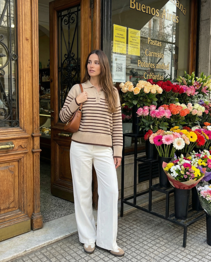 Elegant women's striped polo sweater, relaxed fit. Perfect autumn style pullover top for versatile fashion.