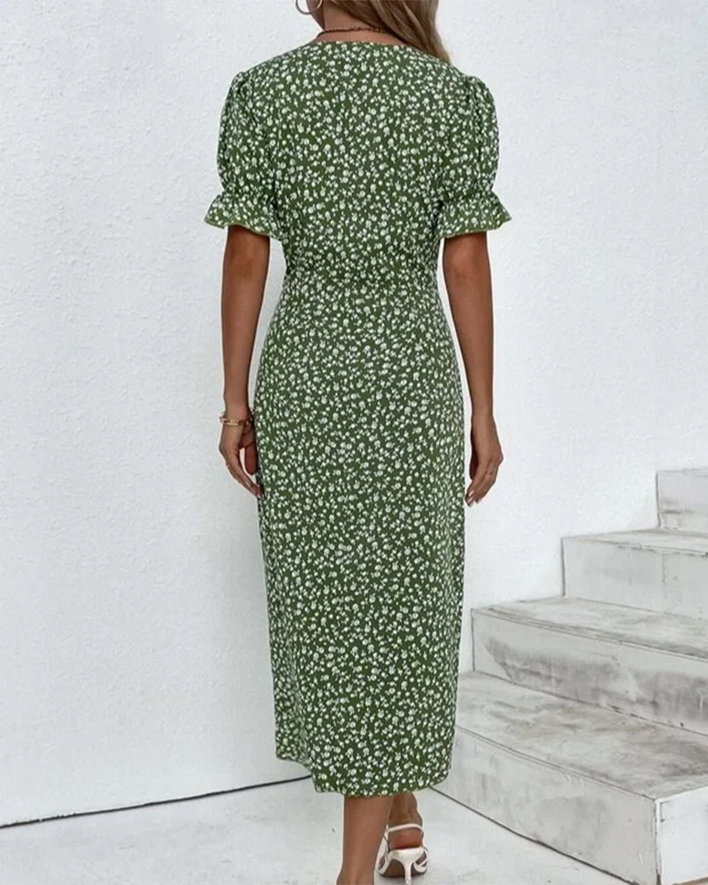 Chic women's floral V-neck wrap midi dress, elegant button details, versatile for spring & summer fashion.
