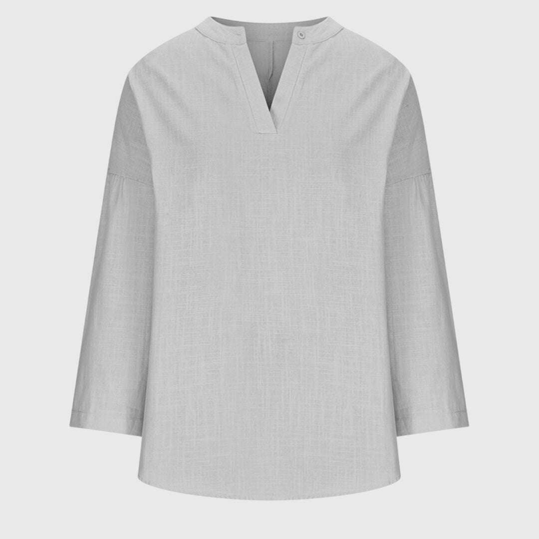 Elegant women's oversized beach shirt, perfect as a stylish cover-up or casual summer top.