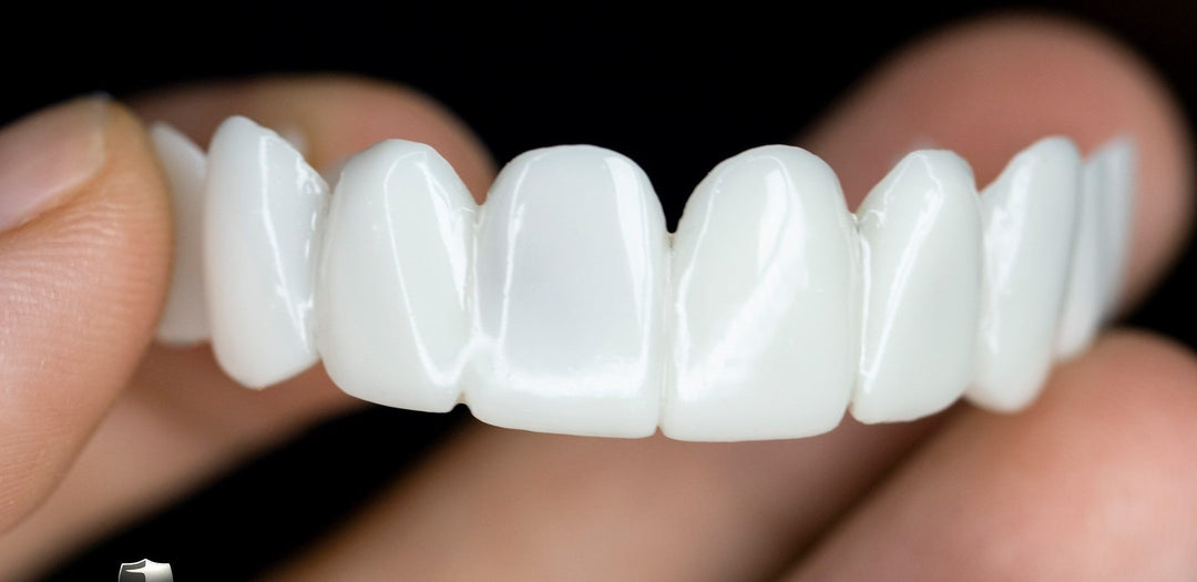 Close-up of a removable tooth veneer, showcasing its natural look for an aesthetic and confident smile.