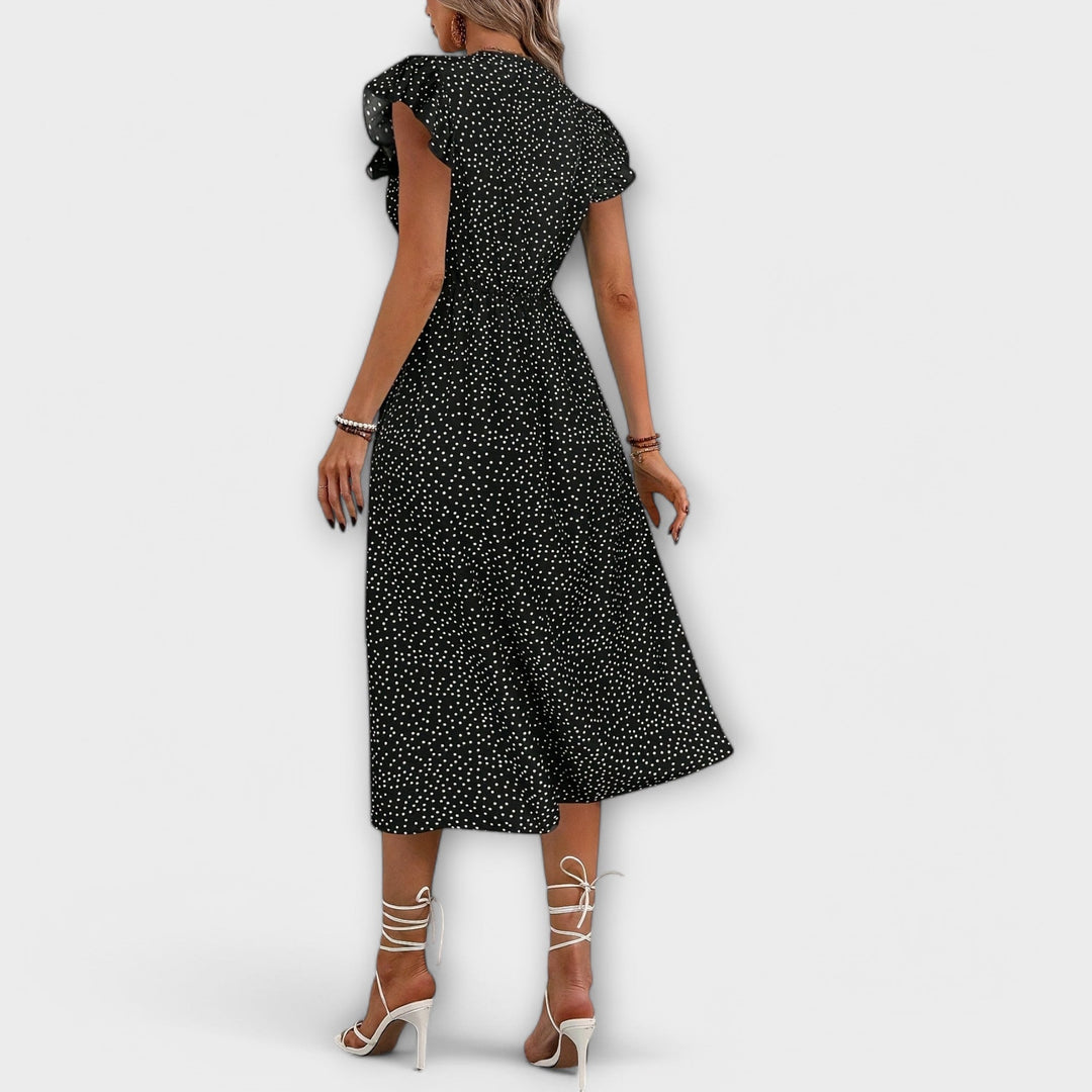 V-neck A-line dress for women, showcasing a charming polka dot design, perfect for elegant casual wear.