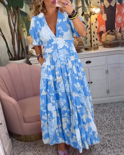 Chic and comfy V-neck maxi dress for women, perfect for summer, featuring a flowy design and pockets.