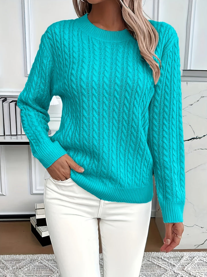Women's soft knit cable knit jumper. Cozy pullover sweater for classic style winter fashion.