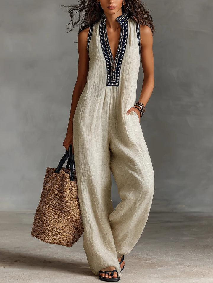 Modern high-neck sleeveless jumpsuit for women. Elegant, versatile, and comfortable for spring & summer fashion.