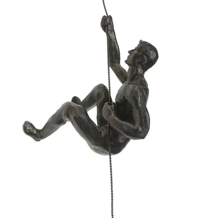 Energetic climbing figures wall sculpture set, modern accent for office decor.