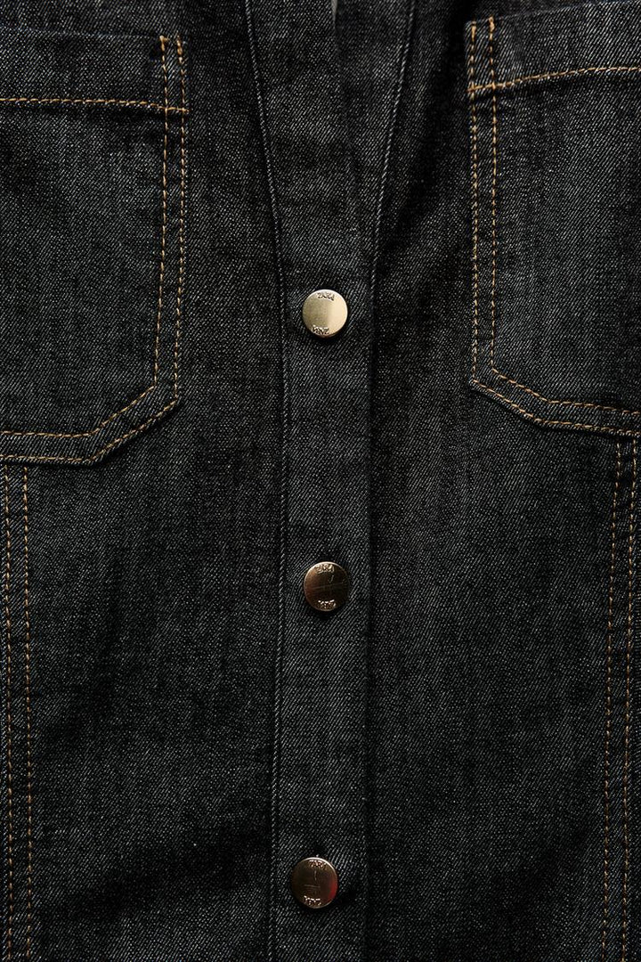 Modern women's fitted blue denim set, a comfortable two-piece outfit with a chic top and trousers for everyday style.