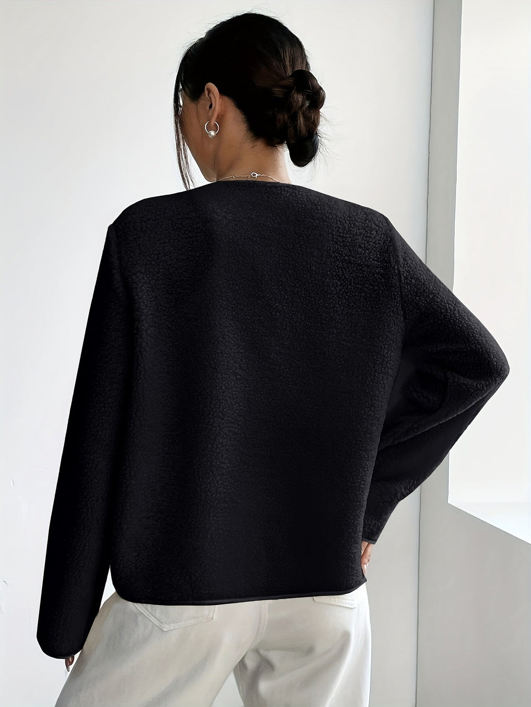 Cream-colored elegant button-front jacket for women. Soft touch, chic autumn-winter ladies fashion.