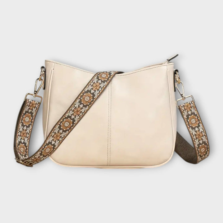 Versatile black vegan tote bag, an eco-friendly women's handbag. Stylish shoulder accessory for any outfit.