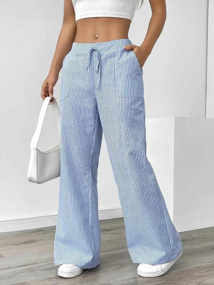 Comfortable women's wide leg pants, vertical stripes, ideal for spring outfits.