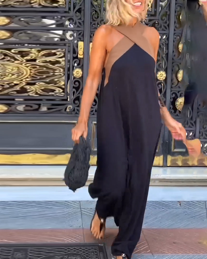 Beautiful elegant women's maxi dress. Cross neck and sleeveless, ideal for formal evening events & parties.