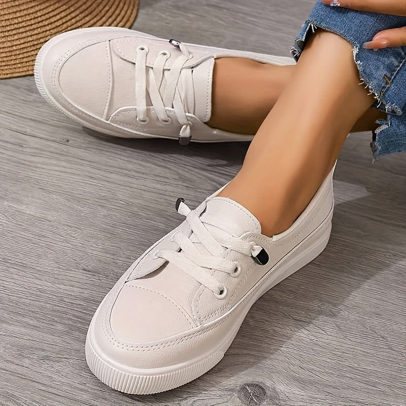 All-day comfort white trainers for women, orthopaedic support & lace-up fit.