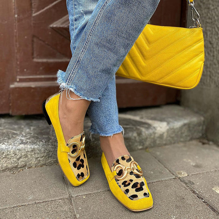 Women's leopard print slip-on moccasins. Comfortable, chic everyday loafers for stylish casual wear.