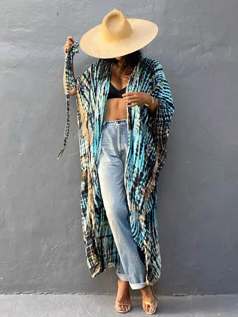 Elegant resort wear: flowy tie-dye sarong cover-up for women's summer vacations.
