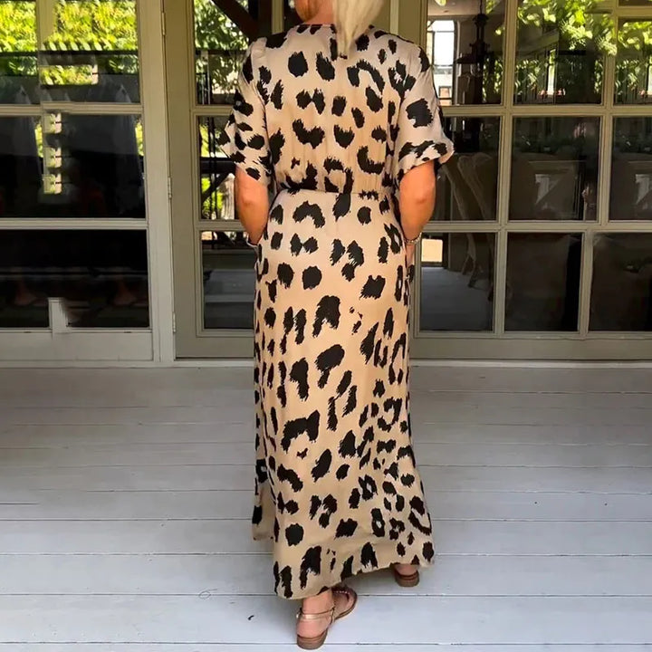 Striking leopard print v-neck maxi dress for women. Flowy, comfortable, and elegant long summer animal print dress.
