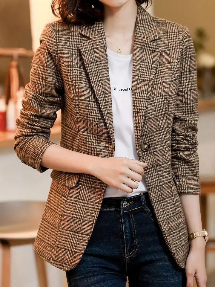Chic women's checked blazer, tailored with classic lapels & a single button. Professional & stylish outerwear.