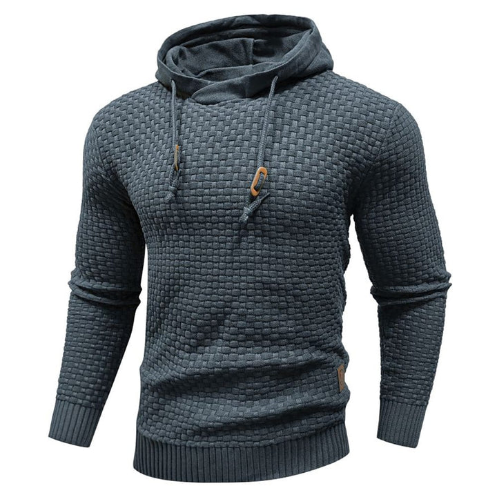 Close-up of the robust men's waffle knit hoodie fabric, highlighting its texture & quality.