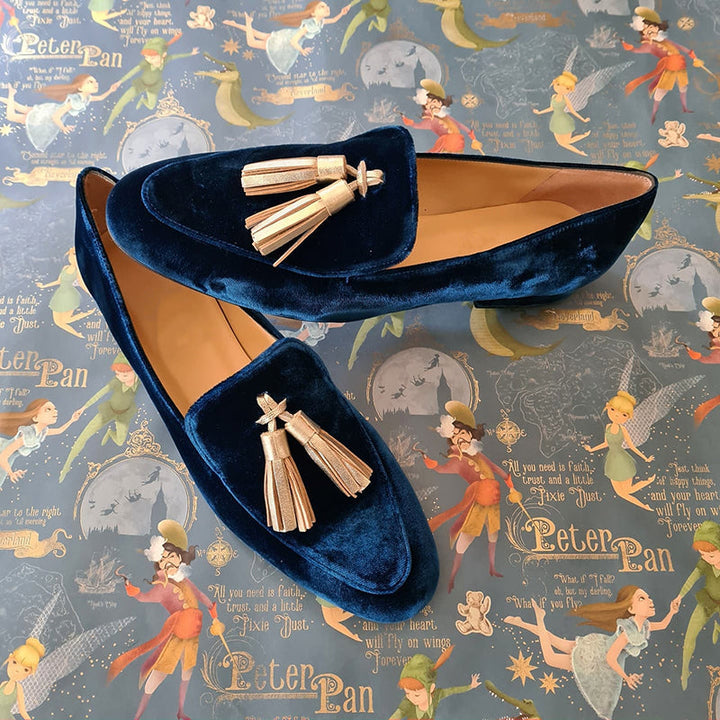 Women's retro blue slip-on loafers with stylish fringe detail for comfortable everyday wear & casual chic fashion.