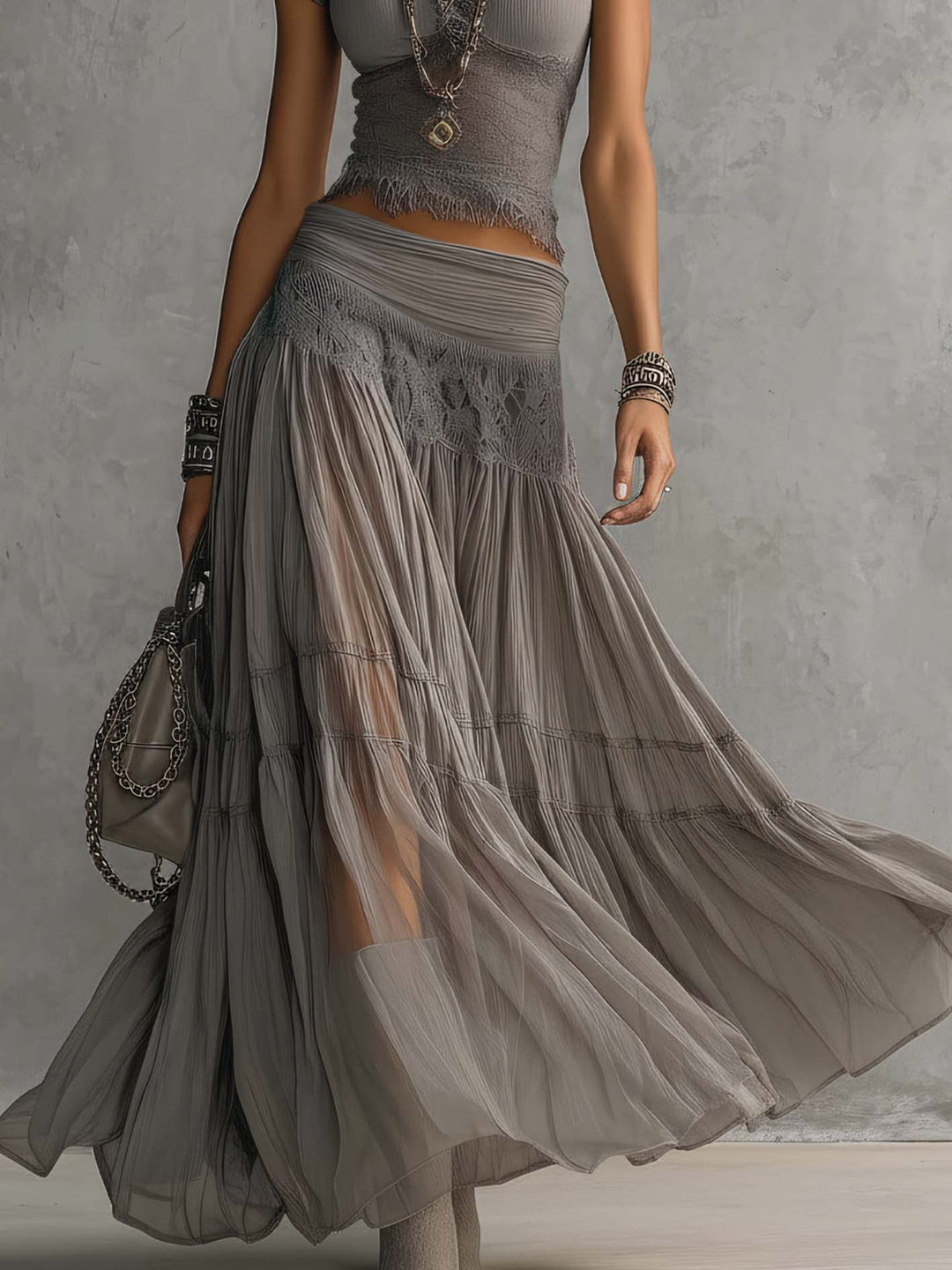 Modern women's grey lace co-ord set. Complete two-piece matching outfit, offering elegant and comfortable style.