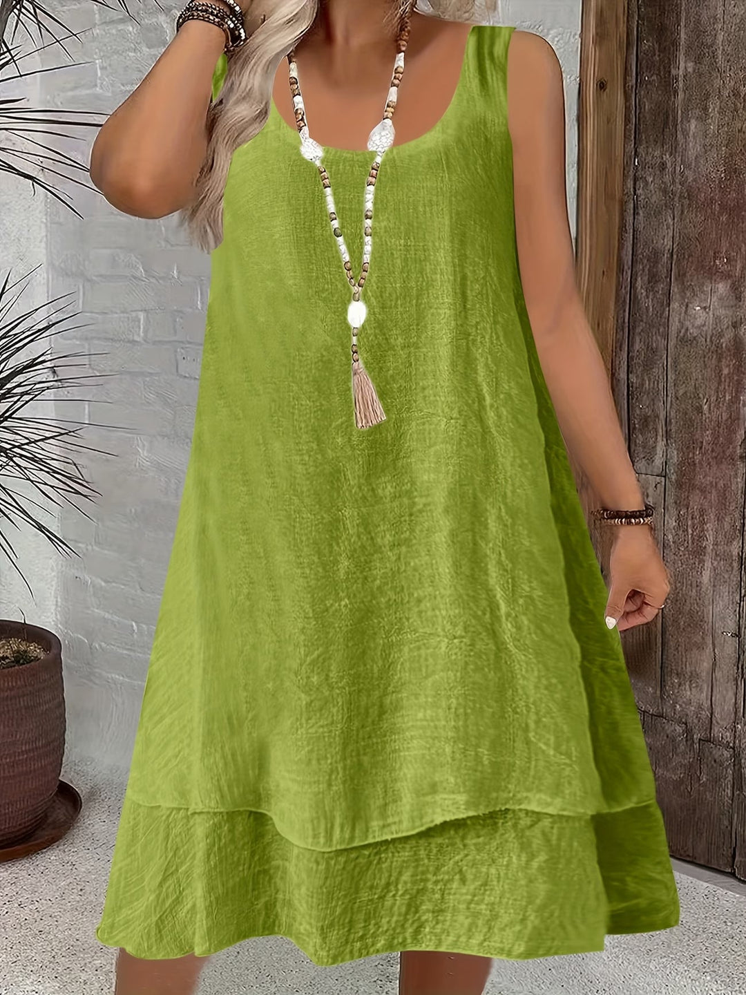 Comfortable women's everyday sleeveless dress with a relaxed loose fit, soft fabric for all-day wear.
