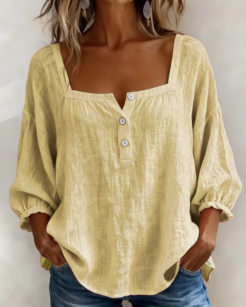 Versatile women's blouse with relaxed fit, puff sleeves, ideal for everyday chic.