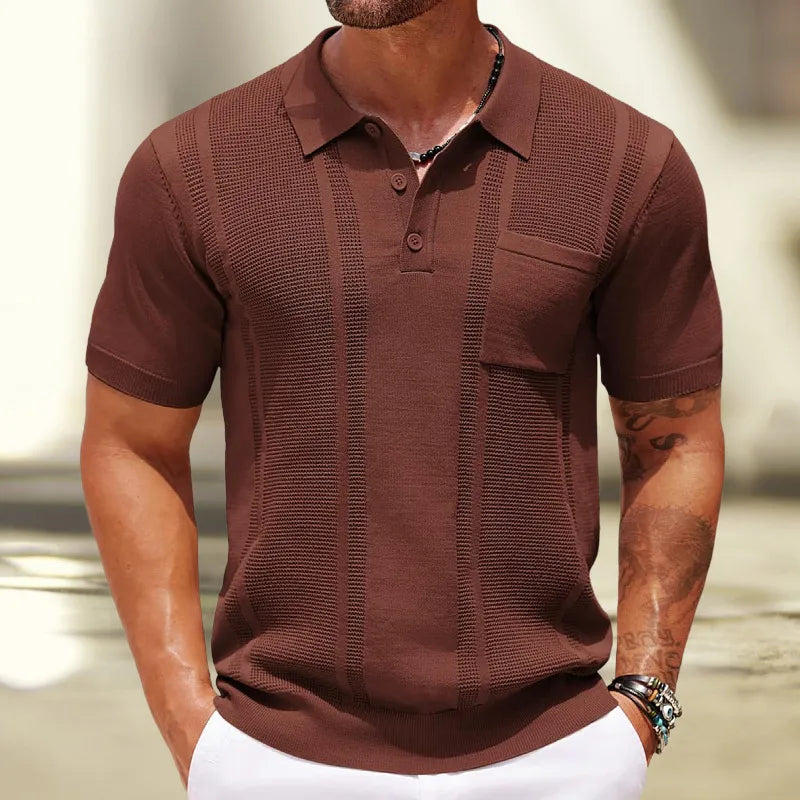 Detail of the classic collar and button placket on a men's textured fine knit polo shirt, ideal for smart casual style.