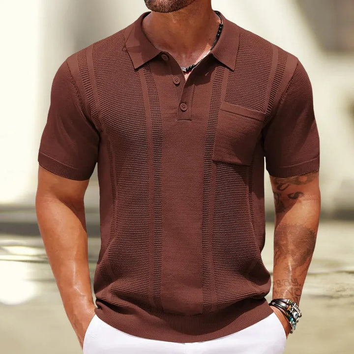 Detail of the classic collar and button placket on a men's textured fine knit polo shirt, ideal for smart casual style.