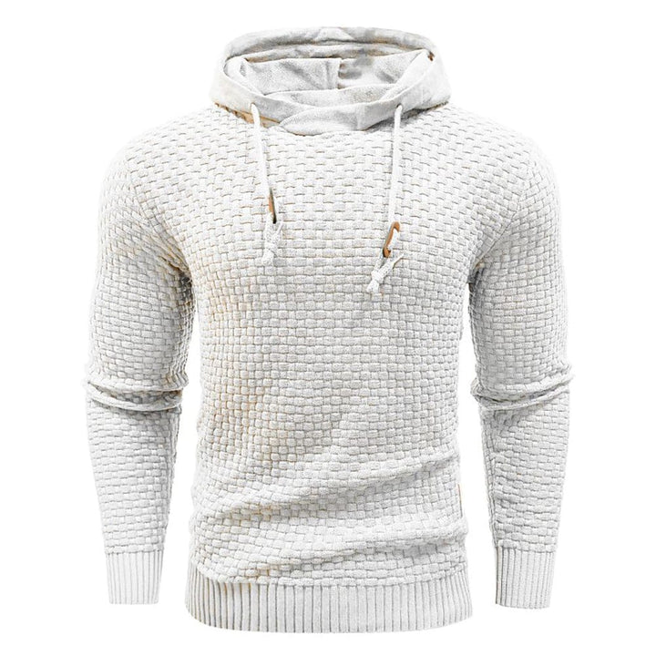 Men's waffle hoodie on a hanger, showcasing its quality fabric & ready-to-wear comfort.