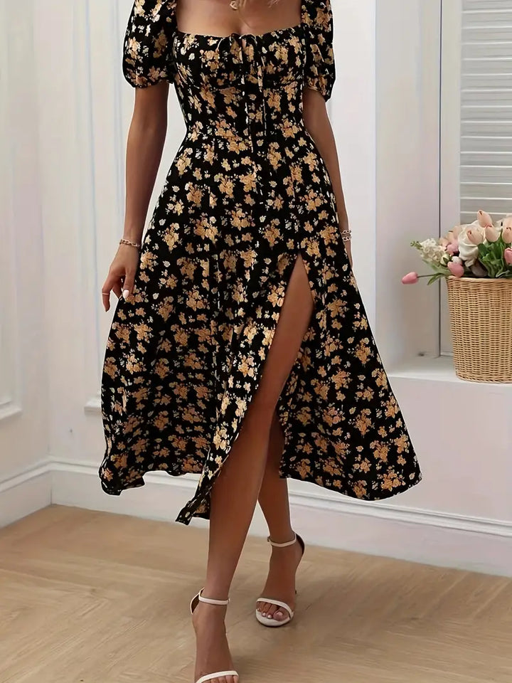 Spring/summer women's floral A-line dress, midi length & trendy puff sleeves for any occasion.
