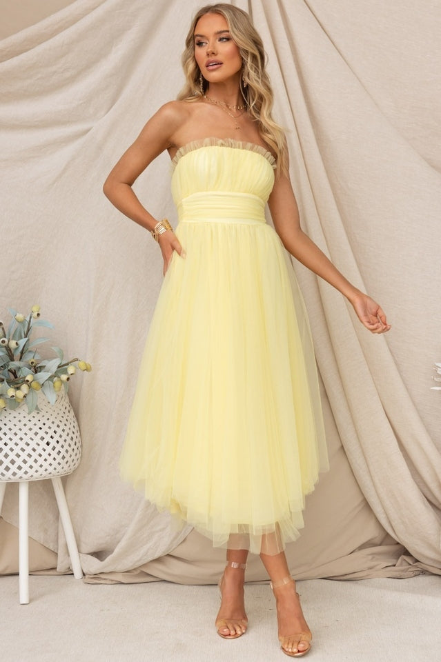 White strapless maxi dress for women, an elegant formal gown ideal for evening parties & events.