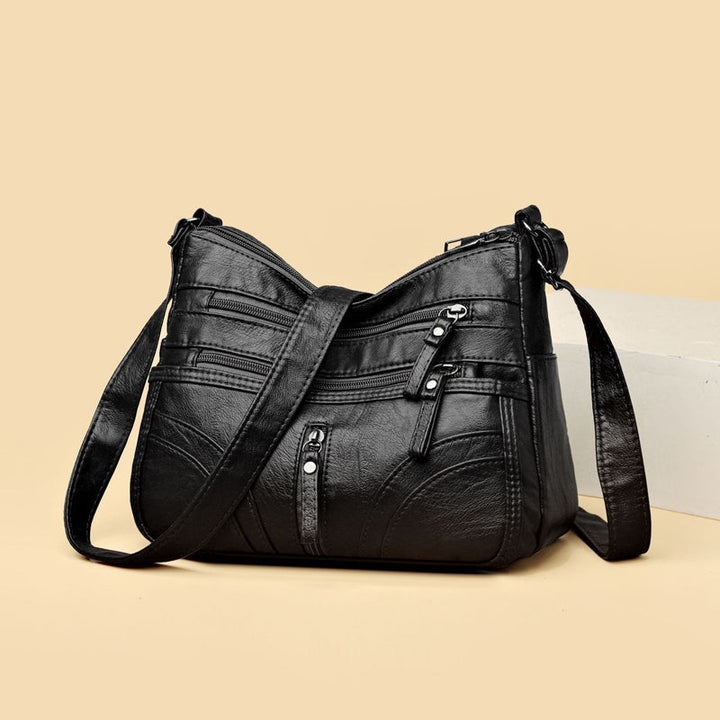 Everyday women's handbag, a relaxed vintage shoulder bag in durable faux leather.