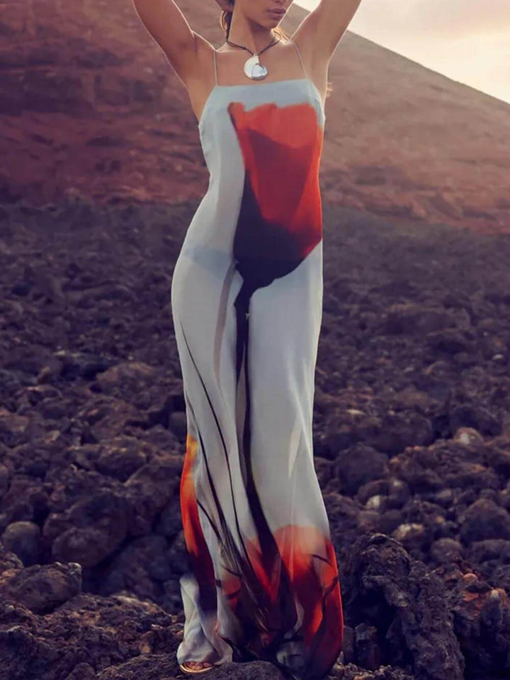 Lightweight flowy women's maxi dress with vibrant abstract print for casual summer fashion.