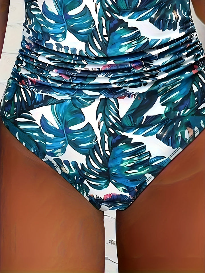 Stylish women's halter V-neck printed swimsuit. Ideal one-piece swimwear for beach days & summer vacation.