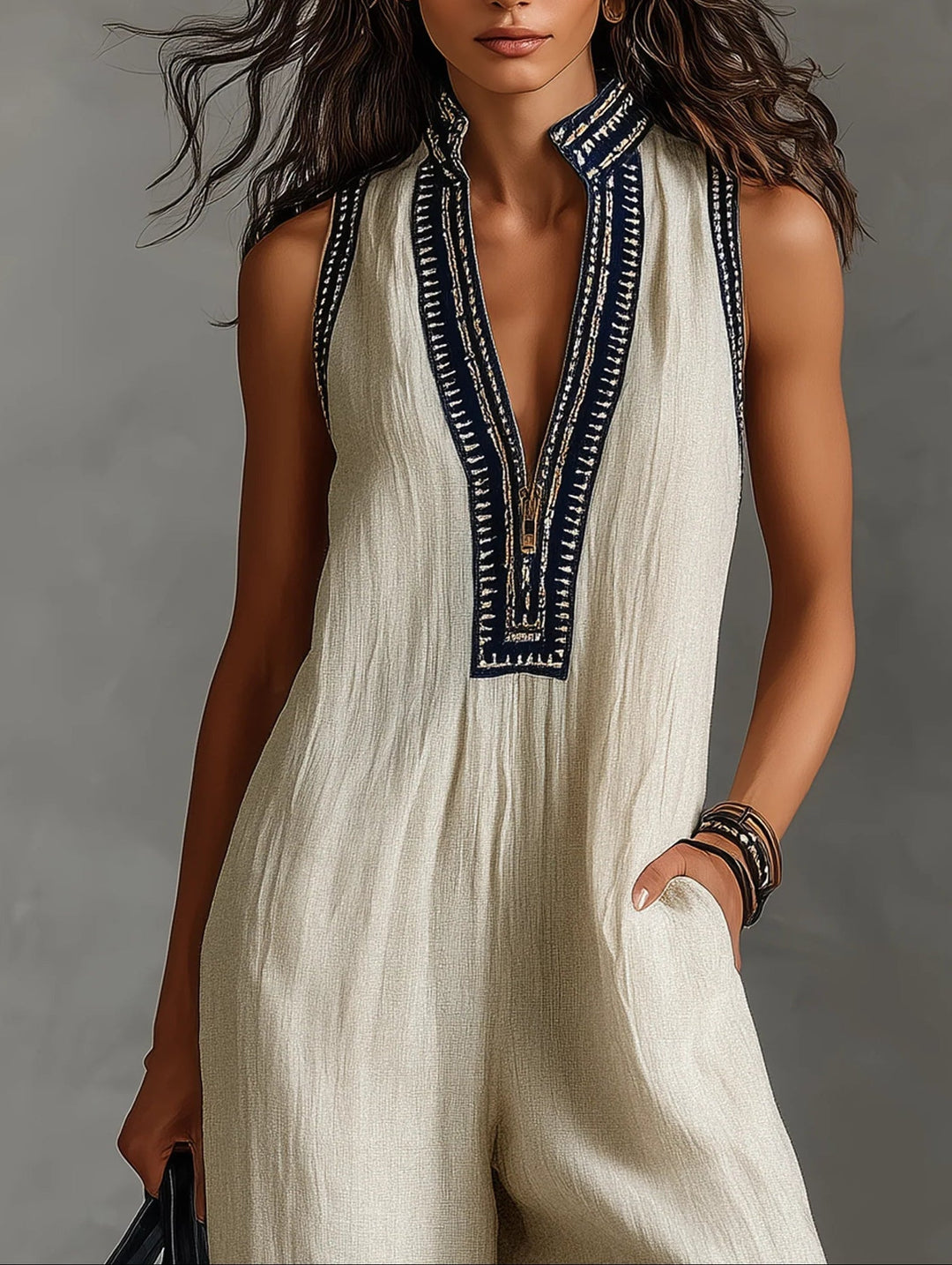 Chic high-neck sleeveless jumpsuit for women. Elegant & modern one-piece outfit, perfect for versatile spring/summer wear.