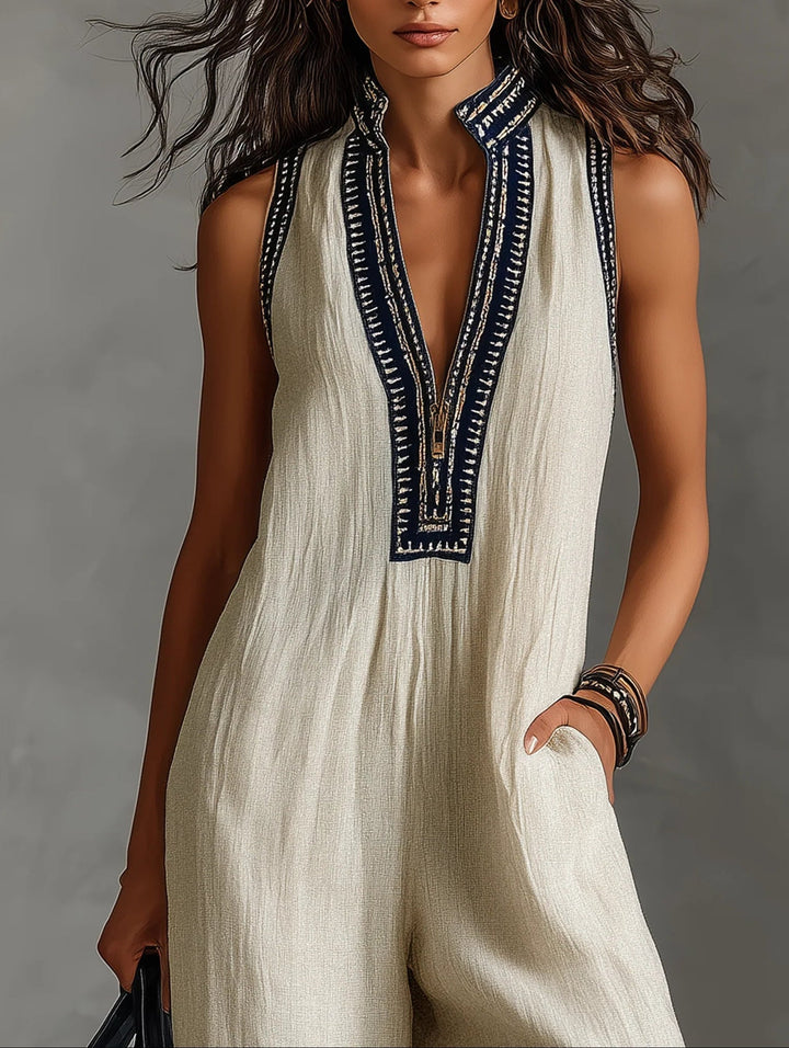 Chic high-neck sleeveless jumpsuit for women. Elegant & modern one-piece outfit, perfect for versatile spring/summer wear.