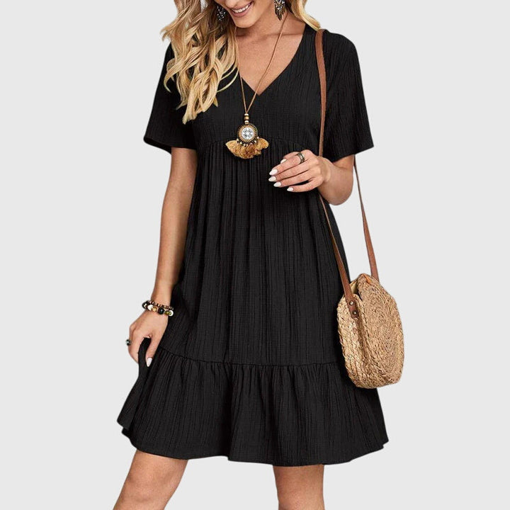 Versatile women's elegant midi dress. Short sleeve design, flattering cut for comfort and style, great for parties/casual.
