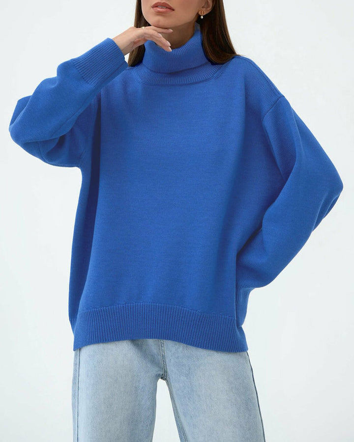 Women's cozy oversized roll neck jumper with relaxed fit & drop shoulder for winter style.