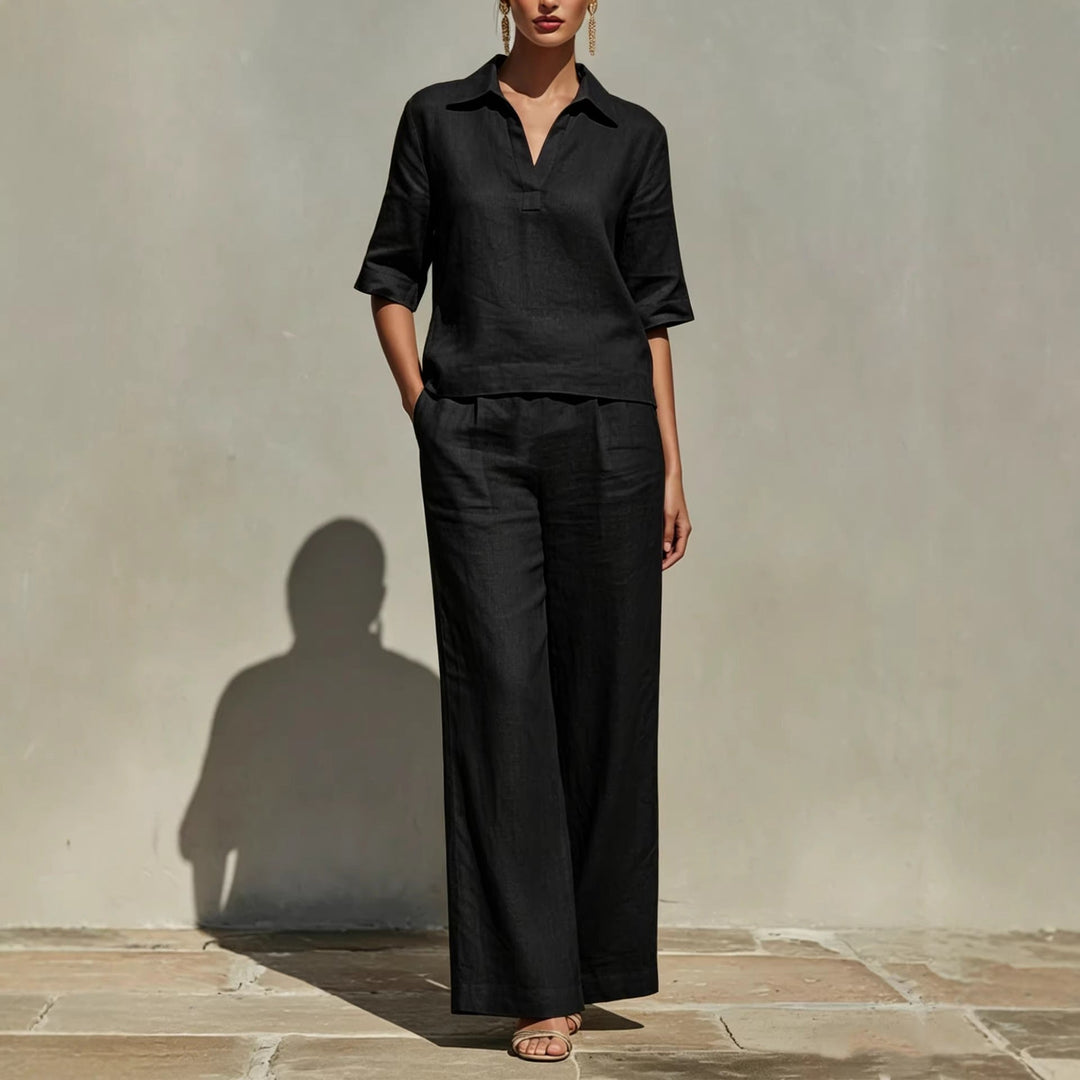 Stylish women's collared short-sleeve top and flowy wide-leg trousers matching set for relaxed summer outfits.