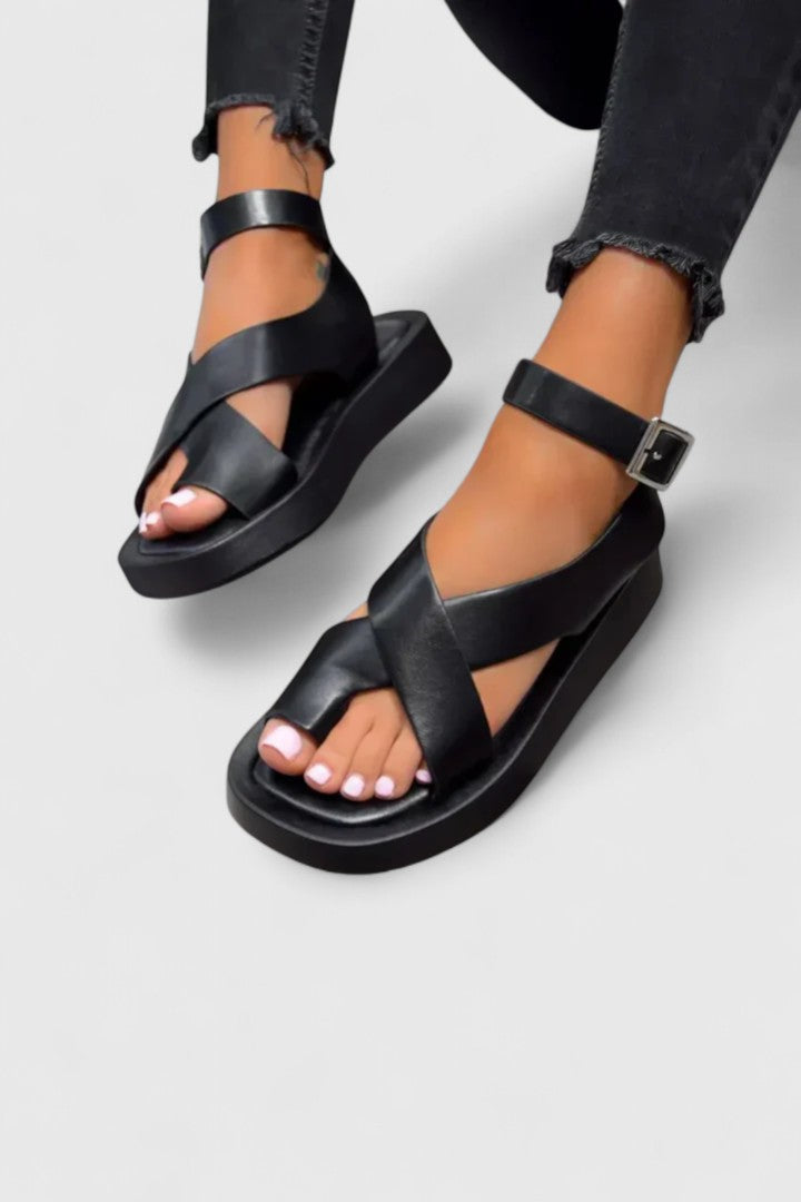 Lightweight, versatile flat sandals for women, great for summer everyday comfort.
