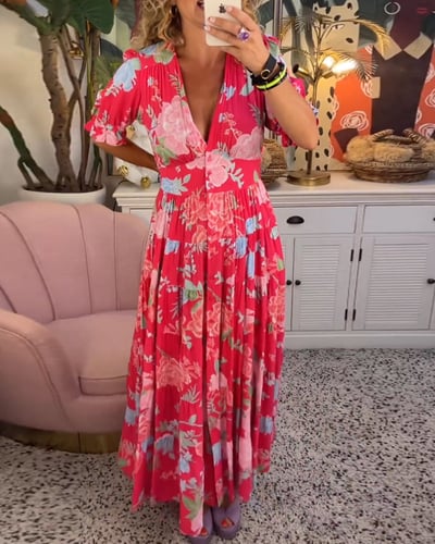 Women's stylish V-neck maxi dress with convenient pockets, ideal for everyday comfort and elegance.