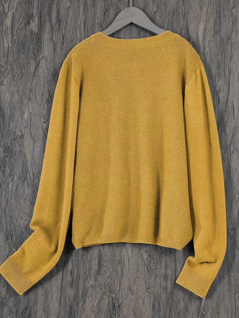 Versatile women's cozy cardigan, an elegant layering piece for all seasons.