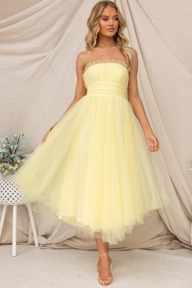 Yellow strapless maxi dress, a sophisticated long evening dress perfect for special occasions.