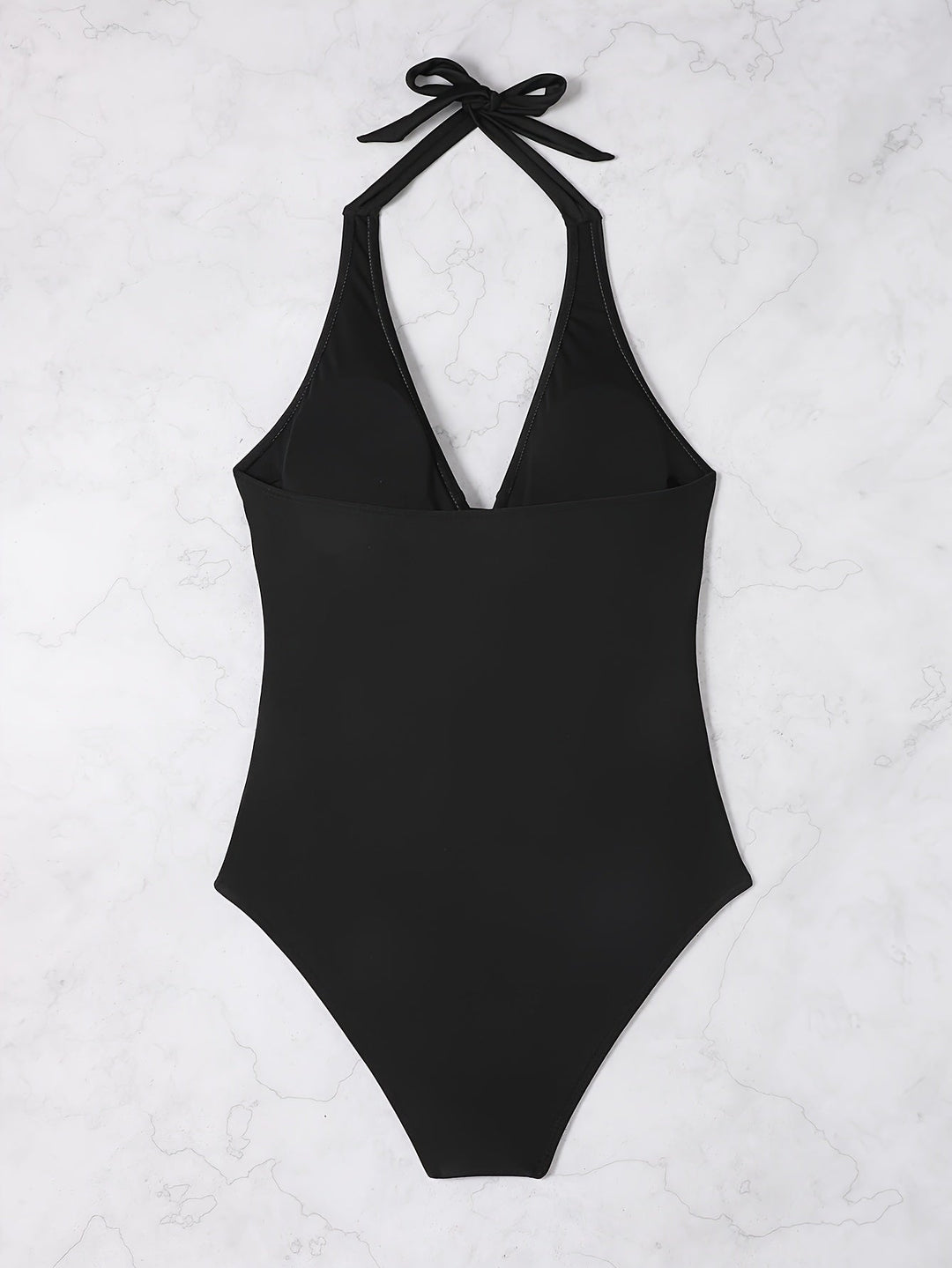 Comfortable women's printed halter V-neck one-piece swimsuit. Perfect swimwear for a chic summer vacation look.