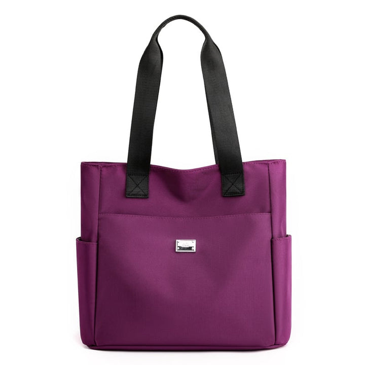Soft violet lightweight waterproof shoulder bag for women, comfortable for daily wear & travel.