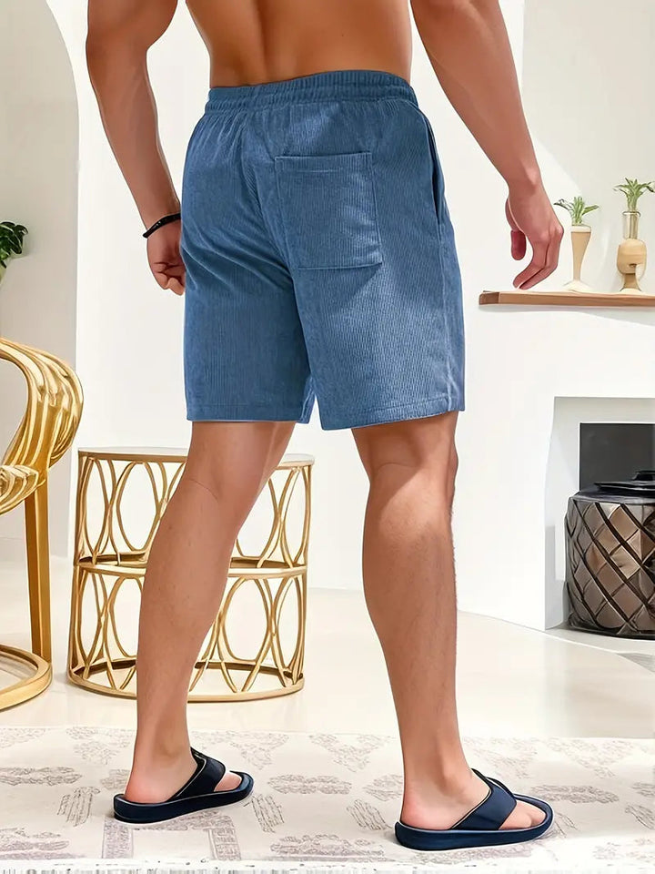 Comfortable men's quick-dry swim shorts for summer, featuring a secure drawstring.