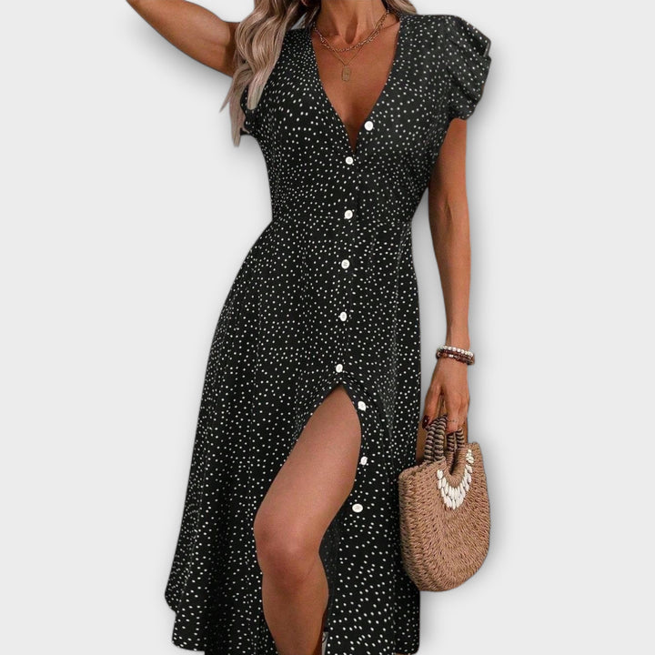 Versatile women's polka dot A-line dress, perfect as a casual yet elegant midi dress for spring & summer.