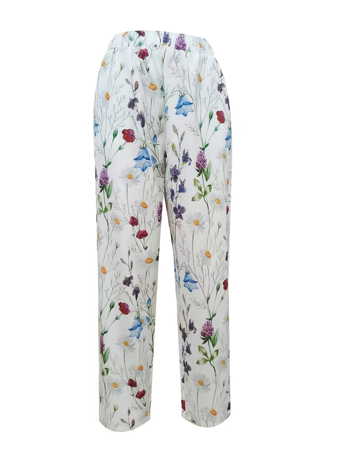 Comfortable women's flowing floral summer trousers. Lightweight, breathable white pants with a relaxed fit for casual elegance.