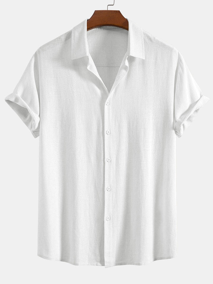 Relaxed fit men's button front shirt, short sleeve design. Versatile for casual & smart casual men's fashion.