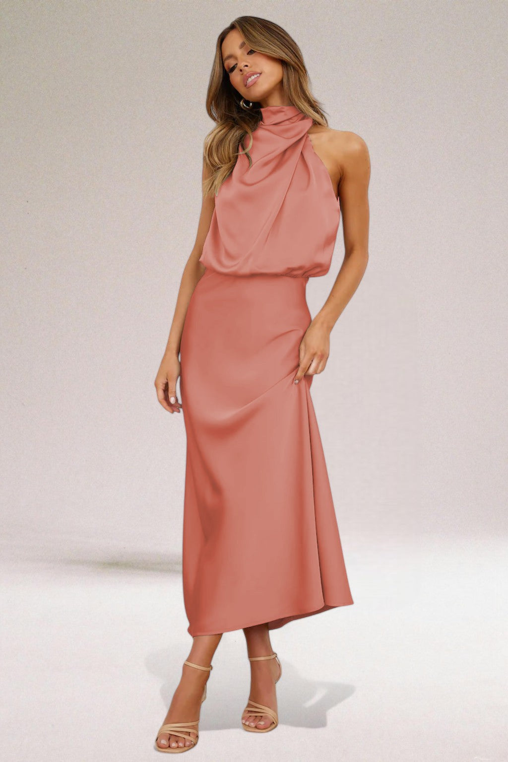 Stunning glamorous women's maxi dress, halter neck design for an unforgettable special occasion.