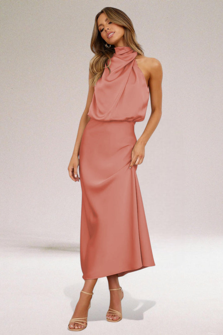 Stunning glamorous women's maxi dress, halter neck design for an unforgettable special occasion.