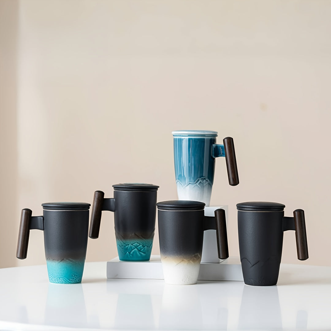 Handcrafted ceramic tea mug with unique textured glaze and strainer for loose leaf tea.